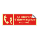 Le téléphone d'alarme incendie est situé :