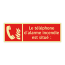 Le téléphone d'alarme incendie est situé :