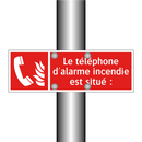 Le téléphone d'alarme incendie est situé :