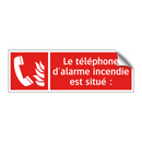 Le téléphone d'alarme incendie est situé :