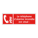 Le téléphone d'alarme incendie est situé :