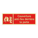 Couverture anti-feu derrière la porte