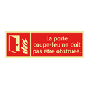 La porte coupe-feu ne doit pas être obstruée.