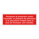 Fermeture de protection contre l'incendie. La présence de personnes et le placement d'objets dans la zone de fermeture sont interdits.