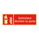 Extincteur derrière la porte