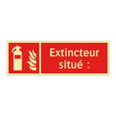 Extincteur situé :
