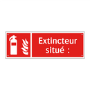 Extincteur situé :