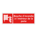 Bouche d'incendie à l'intérieur de la porte