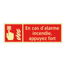 En cas d'alarme incendie, appuyez fort