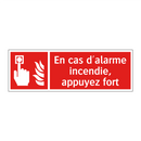 En cas d'alarme incendie, appuyez fort