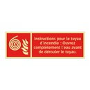 Instructions pour le tuyau d'incendie : Ouvrez complètement l'eau avant de dérouler le tuyau.