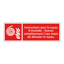 Instructions pour le tuyau d'incendie : Ouvrez complètement l'eau avant de dérouler le tuyau.