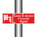 Garder le dévidoir d'incendie dégagé
