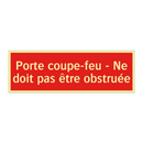 Porte coupe-feu - Ne doit pas être obstruée