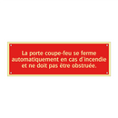 La porte coupe-feu se ferme automatiquement en cas d'incendie et ne doit pas être obstruée.