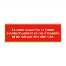 La porte coupe-feu se ferme automatiquement en cas d'incendie et ne doit pas être obstruée.