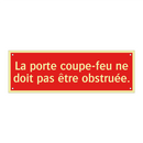 La porte coupe-feu ne doit pas être obstruée.