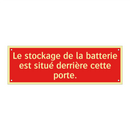 Le stockage de la batterie est situé derrière cette porte.