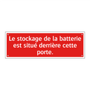 Le stockage de la batterie est situé derrière cette porte.