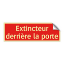 Extincteur derrière la porte