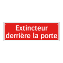Extincteur derrière la porte