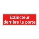 Extincteur derrière la porte