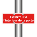 Extincteur à l'intérieur de la porte