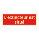 L'extincteur est situé