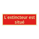 L'extincteur est situé