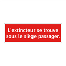 L'extincteur se trouve sous le siège passager.