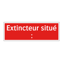 Extincteur situé :
