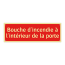 Bouche d'incendie à l'intérieur de la porte