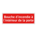 Bouche d'incendie à l'intérieur de la porte