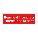 Bouche d'incendie à l'intérieur de la porte