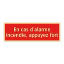 En cas d'alarme incendie, appuyez fort