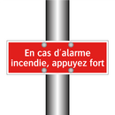 En cas d'alarme incendie, appuyez fort