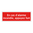 En cas d'alarme incendie, appuyez fort