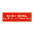 En cas d'incendie, n'utilisez pas l'ascenseur