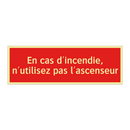 En cas d'incendie, n'utilisez pas l'ascenseur