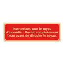 Instructions pour le tuyau d'incendie : Ouvrez complètement l'eau avant de dérouler le tuyau.