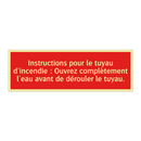 Instructions pour le tuyau d'incendie : Ouvrez complètement l'eau avant de dérouler le tuyau.