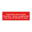 Instructions pour le tuyau d'incendie : Ouvrez complètement l'eau avant de dérouler le tuyau.