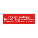 Instructions pour le tuyau d'incendie : Ouvrez complètement l'eau avant de dérouler le tuyau.