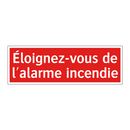 Éloignez-vous de l'alarme incendie