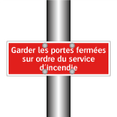 Garder les portes fermées sur ordre du service d'incendie