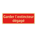Garder l'extincteur dégagé