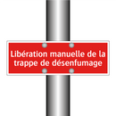 Libération manuelle de la trappe de désenfumage