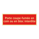 Porte coupe-fumée en coin ou en bloc interdite