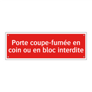 Porte coupe-fumée en coin ou en bloc interdite