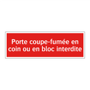 Porte coupe-fumée en coin ou en bloc interdite